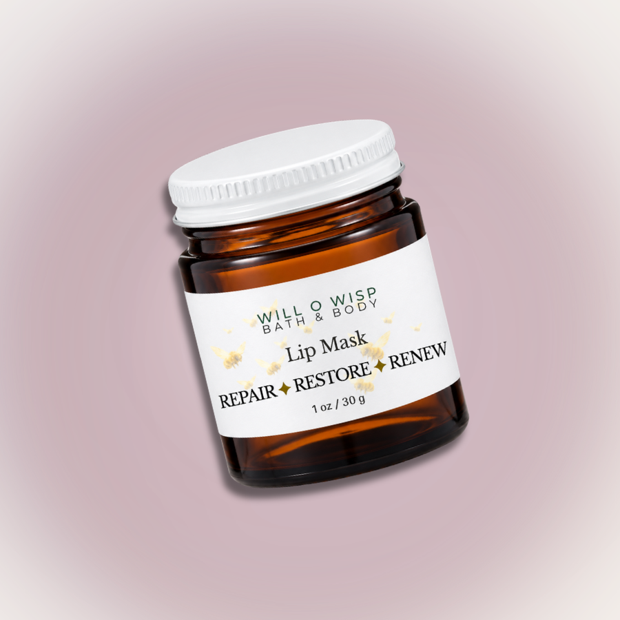 WILL O WISP BATH & BODY nourishing lip mask in a small amber glass jar with a white lid and bee-patterned label.