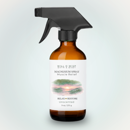 WILL O WISP BATH & BODY magnesium spray in an amber glass bottle with a black trigger sprayer for muscle relief.