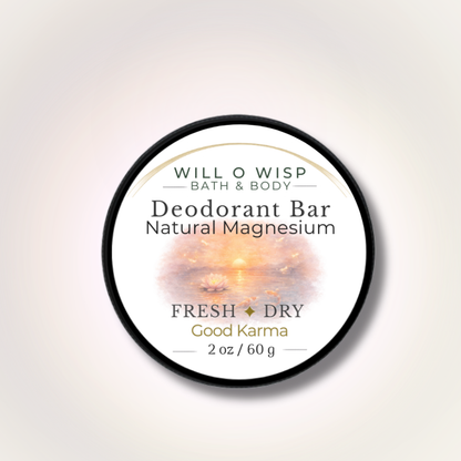 WILL O WISP BATH & BODY Good Karma natural magnesium deodorant bar in a round black tin with a sunset lotus label.