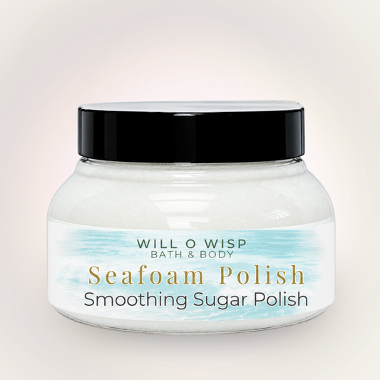 WILL O WISP BATH & BODY Seafoam Polish in a clear glass jar with a black lid, featuring a beach-inspired label.
